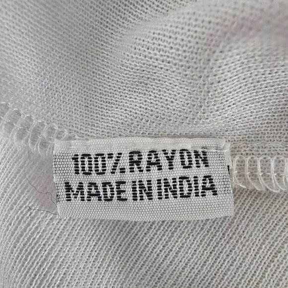 Elegant White Maxi Dress with Gold Accents - Picture 11 of 12